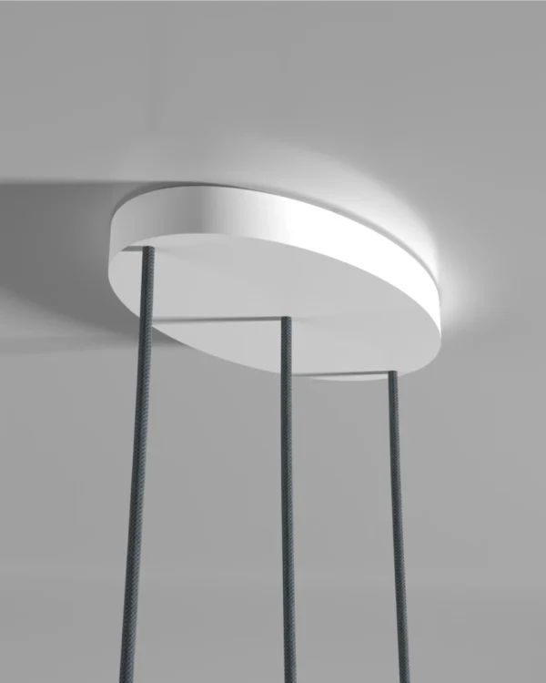 Detailed view of the Kaluma KIVO Trio Oval Cable Canopy crafted from sustainable PLA installed on a ceiling with the cables.