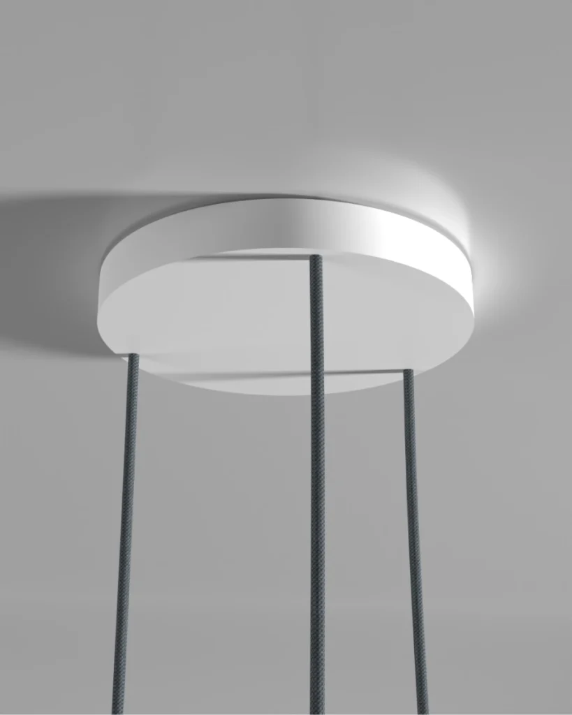 Detailed view of the Kaluma KIVO Trio Round Cable Canopy crafted from sustainable PLA installed on a ceiling with the cables.